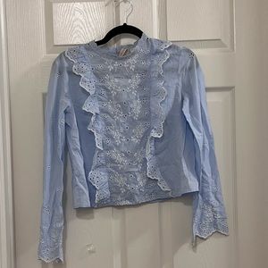 Blue Ruffled Blouse with Floral stitching